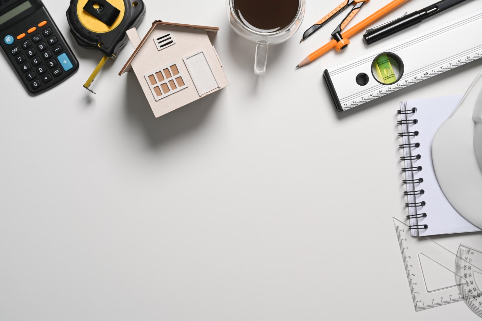 Above view construction engineer tools on white table.